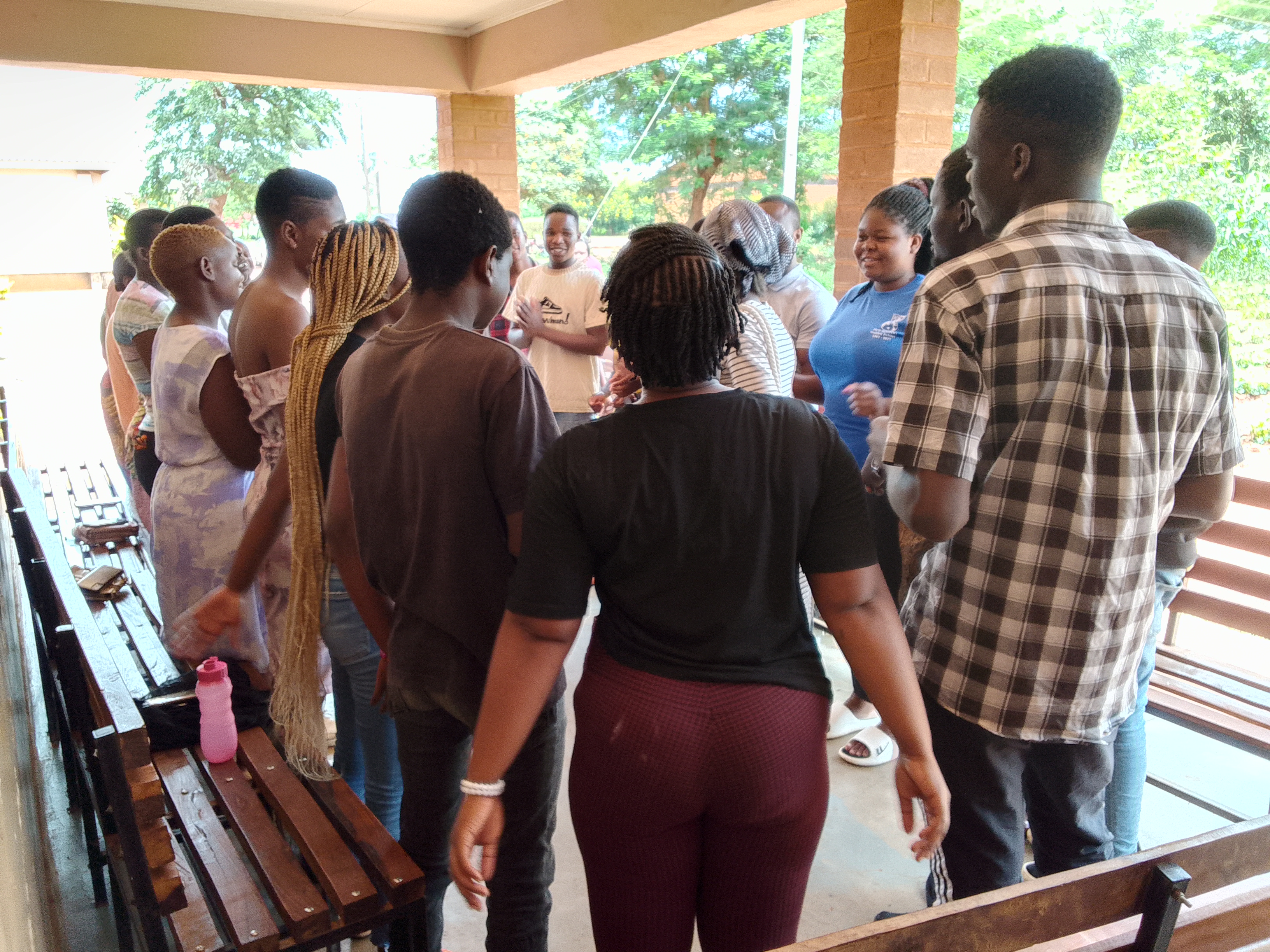 Youth club members meeting during a CIRE session